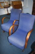 Pair of 1930's Art Deco oak framed rocking chairs