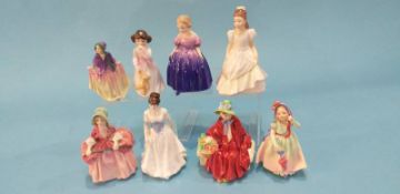 Eight small Royal Doulton figures