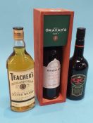 A bottle of Grahams Port 2001, a bottle of Teachers whisky and a bottle of QC