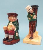 A Royal Doulton 'Old Charley' toby jug and a Bretby table lamp of a man leaning against a lamp