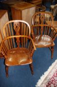 A good pair of Windsor stick back armchairs