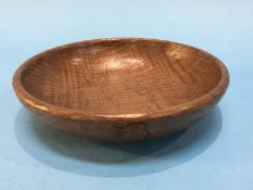 A Mouseman style oak shallow bowl, carved with a Kingfisher, 20cm diameter