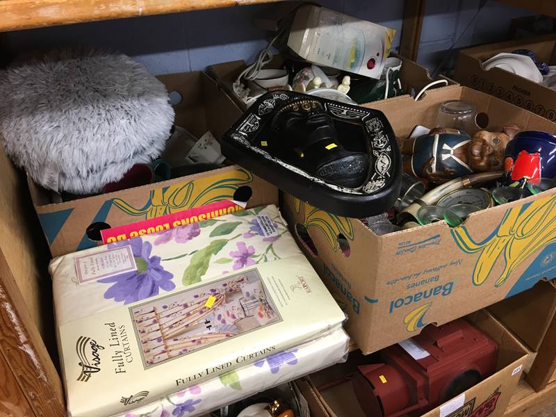 Shelf of assorted, including a plaster plaque