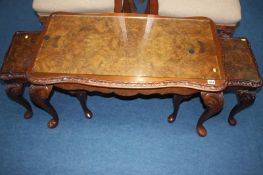 A walnut nest of tables