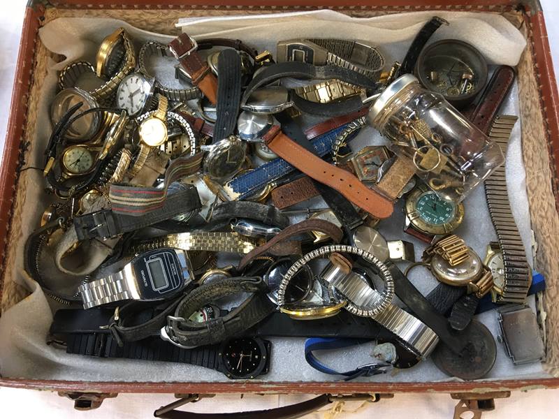 A large quantity of gentleman's wristwatches and watch keys etc.