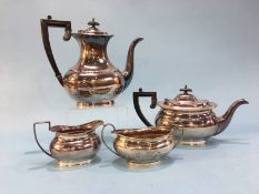 A silver three piece tea service, E.H. Parkin and Co., Sheffield, 1964, together with a similar