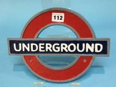 A cast 'Underground' sign