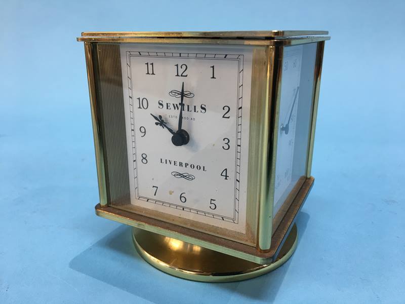 A Sewills of Liverpool, revolving square four glass clock, with clock, Hygo, thermometer and