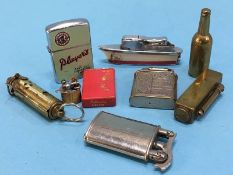 A collection of lighters, various