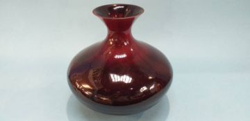 A large Sang De Boeuf style squat shaped vase, 31cm height