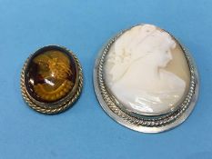 A sterling silver backed Cameo and a 9ct gold mounted amber intaglio (2)