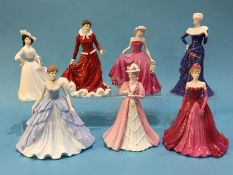 A selection of Doulton, Worcester and Coalport figurines