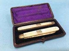 Cased mother of pearl handled silver knife and fork