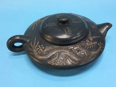 A Chinese squat shaped teapot, seal mark to base, 35cm diameter, 12cm height