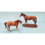Two Royal Doulton horses