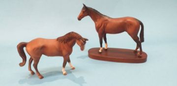 Two Royal Doulton horses