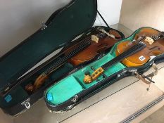 Two violins and cases