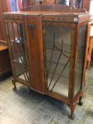 A walnut china cabinet