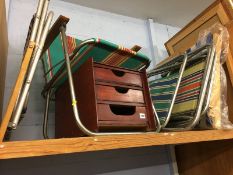 Shelf of retro camping chairs