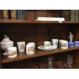 Various commemorative mugs