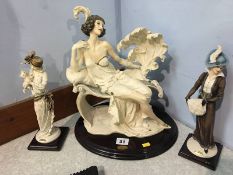 Three Florence / Armani figures