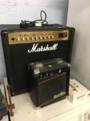 Marshall amplifier and footswitch a Gorilla mini amplifier and an Ibanez guitar