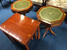 Yew wood nest of tables and a pair of lamp tables