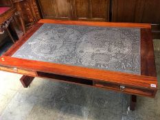 A Scandinavian rosewood coffee table with inset map top