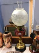 Oil lamp with cranberry glass reservoir