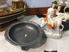 Staffordshire figure 'Tom King' and a pewter bowl