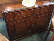 A mahogany side cabinet