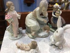 Five Lladro and Nao figures