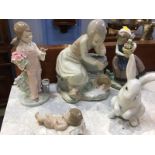 Five Lladro and Nao figures