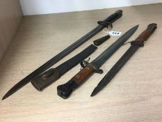 Three various bayonets