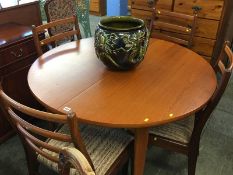 Teak dining table and four chairs