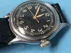 A Military watch with black dial, numerals, the reverse stamped 6B/234 and A9867