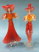 A pair of Murano glass figures in red, white and orange, 38cm height