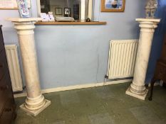 A tall pair of white marble Doric columns, 122cm height, 30cm top wide
