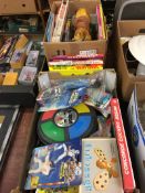 Two boxes of games, toys and annuals
