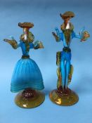 A pair of Murano glass figures of a lady and gentleman in turquoise and amber, 40cm height