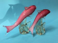 Two large Murano pink and clear cased glass leaping dolphins, 43cm wide x 29cm height and 15cm