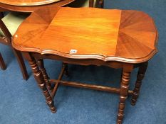 A mahogany occasional table