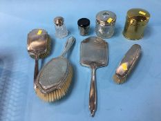 A silver hand mirror brush, a quantity of coins etc.