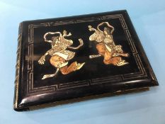 An Oriental lacquered photograph album