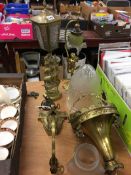 A gilt metal and glass ceiling light, two table lamps and a wall light