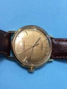 An Omega Seamaster automatic gentleman's wrist watch, with gold coloured dial and batons