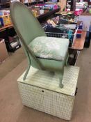 Green basket weave chair and a box of linen