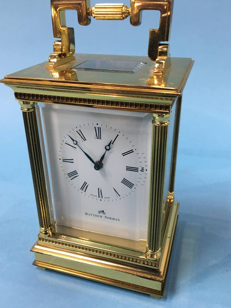 A Matthew and Norman carriage clock, with strike action