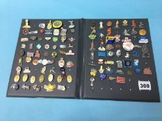 A folder of various enamel and other badges
