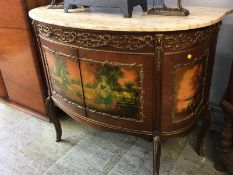 A Louis XV style marble top side cabinet, the front with decorative panels